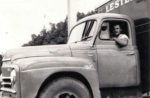 Man sitting in an old truck